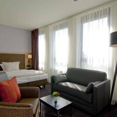 Отель ACHAT Premium Hotel München Süd Германия, Мюнхен - 1 отзыв об отеле, цены и фото номеров - забронировать отель ACHAT Premium Hotel München Süd онлайн комната для гостей фото 3