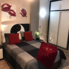 Апартаменты Namaste Apartment Торремолинос комната для гостей