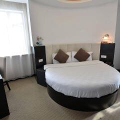 Отель Joyfulstar Hotel Pudong Airport Chenyang Китай, Шанхай - отзывы, цены и фото номеров - забронировать отель Joyfulstar Hotel Pudong Airport Chenyang онлайн комната для гостей фото 2