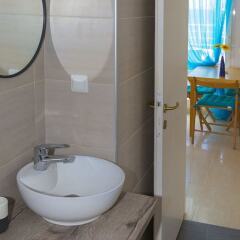 Отель Salonikiou Beach Deluxe Apartments Греция, Аристотелес - отзывы, цены и фото номеров - забронировать отель Salonikiou Beach Deluxe Apartments онлайн ванная фото 2