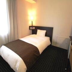 APA Hotel Nagasaki-Ekimae Нагасаки комната для гостей