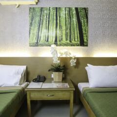Отель Quoalla Hotel Makati Филиппины, Макати - 1 отзыв об отеле, цены и фото номеров - забронировать отель Quoalla Hotel Makati онлайн комната для гостей фото 2