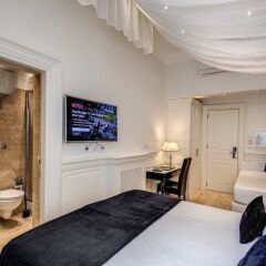 Hotel dei Quiriti Suite комната для гостей фото 7