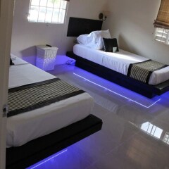 Отель Zades Vacation Home Ямайка, Очо-Риос - отзывы, цены и фото номеров - забронировать отель Zades Vacation Home онлайн комната для гостей