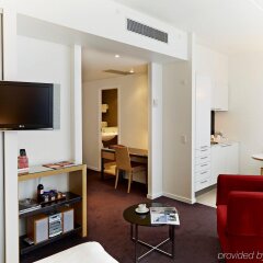 Отель Adina Apartment Hotel Copenhagen Дания, Копенгаген - 1 отзыв об отеле, цены и фото номеров - забронировать отель Adina Apartment Hotel Copenhagen онлайн комната для гостей фото 2