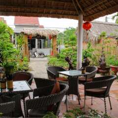 Отель The Grass Vy Homestay Хойан питание