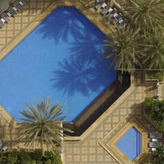Отель Ramada Downtown Dubai ОАЭ, Дубай - 3 отзыва об отеле, цены и фото номеров - забронировать отель Ramada Downtown Dubai онлайн бассейн фото 2