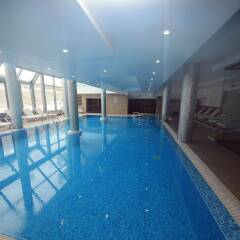 Отель MPM Guiness Hotel Болгария, Банско - отзывы, цены и фото номеров - забронировать отель MPM Guiness Hotel онлайн бассейн фото 2