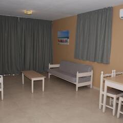 Christabelle Hotel Apartments комната для гостей