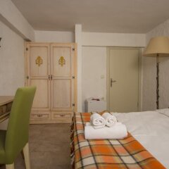 Отель Otello Alacati Чешме сейф в номере