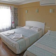 Assos Hotel комната для гостей фото 2