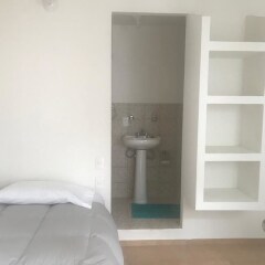 Отель Hermila Tlalpan Suites Мехико ванная