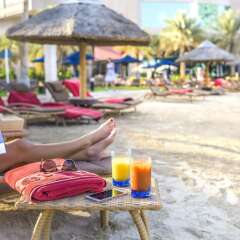 Отель Beach Rotana All Suites пляж фото 2