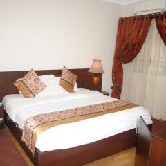 Отель Grand Inn & Suites комната для гостей фото 4