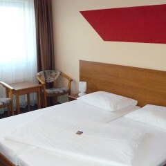 astral Inn Hotel Leipzig Лейпциг комната для гостей фото 5