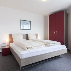 Апартаменты EMA house Serviced Apartments, Aussersihl Цюрих комната для гостей фото 5