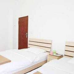 Апартаменты Xingyuan Apartment Сямынь комната для гостей фото 2