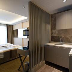 Отель GK Regency Suites в номере