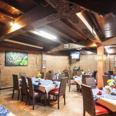 Отель Satriya Cottages питание