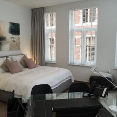 Отель Antwerp Business Suites Бельгия, Антверпен - отзывы, цены и фото номеров - забронировать отель Antwerp Business Suites онлайн комната для гостей фото 5