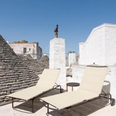Отель Trulli Pietradimora B&B Альберобелло бассейн