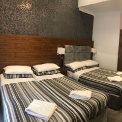 Отель Leisure Inn комната для гостей фото 3