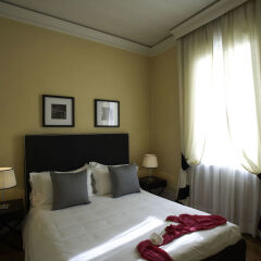 Отель Tornabuoni Suites Collection комната для гостей