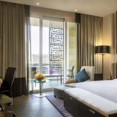 Отель The Boulevard Arjaan by Rotana удобства в номере