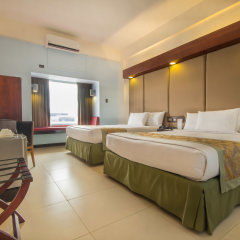 Отель Microtel by Wyndham Mall of Asia Филиппины, Пасай - отзывы, цены и фото номеров - забронировать отель Microtel by Wyndham Mall of Asia онлайн комната для гостей фото 5