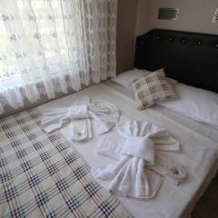 Akkuslar Hotel Турция, Айвалык - отзывы, цены и фото номеров - забронировать отель Akkuslar Hotel онлайн комната для гостей