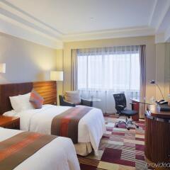 Отель Crowne Plaza City Center Ningbo комната для гостей фото 2