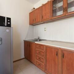 Апартаменты Two Bedroom Apartment with Kitchen в номере