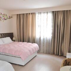Select City Center Hotel Тирана комната для гостей