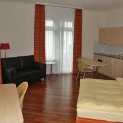 Апартаменты Accademia Apartments Цюрих комната для гостей фото 4