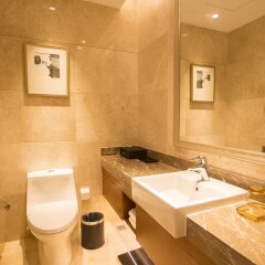 Отель Golden Tulip Suzhou Residence ванная фото 2