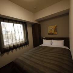 Отель Route Inn Nagoya Imaike Ekimae Япония, Нагоя - отзывы, цены и фото номеров - забронировать отель Route Inn Nagoya Imaike Ekimae онлайн комната для гостей