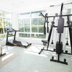 Апартаменты BBG Seaside Luxurious Service Apartment фитнесс-зал фото 2