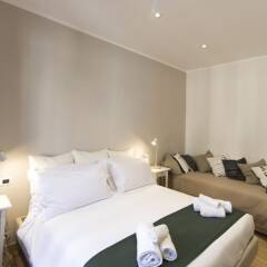 Отель Bb Colosseo Suites Рим комната для гостей фото 5