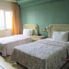 Hotel Nueva Galicia комната для гостей фото 4
