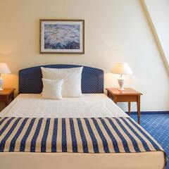 Victor's Residenz Hotel Leipzig Лейпциг комната для гостей фото 4