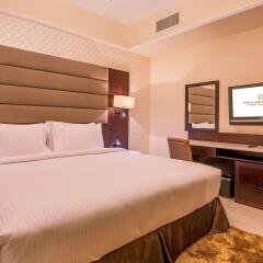 Emirates Grand Hotel Apartments комната для гостей