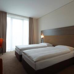 Отель IntercityHotel Dresden Германия, Дрезден - 5 отзывов об отеле, цены и фото номеров - забронировать отель IntercityHotel Dresden онлайн комната для гостей фото 4