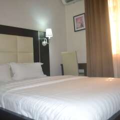 Отель Mac Dove Lounge & Suites ltd комната для гостей фото 3