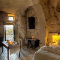 Отель Sextantio Le Grotte Della Civita Матера комната для гостей