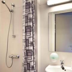 Отель Lillehammer Stasjonen Hotel & Hostel Норвегия, Лиллехаммер - отзывы, цены и фото номеров - забронировать отель Lillehammer Stasjonen Hotel & Hostel онлайн ванная