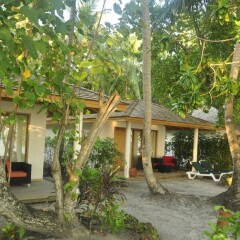 Отель Vilamendhoo Island Resort & Spa