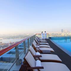 Отель Hilton Dubai Creek бассейн фото 2