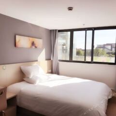 Отель Hi Inn Shanghai Pudong International Airport Chenyang Road Китай, Шанхай - отзывы, цены и фото номеров - забронировать отель Hi Inn Shanghai Pudong International Airport Chenyang Road онлайн комната для гостей фото 3