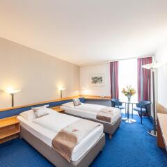 Отель Novum Hotel Kavalier Wien Австрия, Вена - 4 отзыва об отеле, цены и фото номеров - забронировать отель Novum Hotel Kavalier Wien онлайн комната для гостей фото 2
