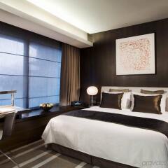 Отель Pan Pacific Serviced Suites Orchard, Singapore Сингапур, Сингапур - отзывы, цены и фото номеров - забронировать отель Pan Pacific Serviced Suites Orchard, Singapore онлайн комната для гостей фото 2